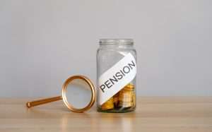 Pensions pot with magnifying glass