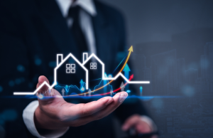 Business man holding virtual house
