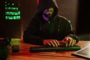 Hooded man defrauding